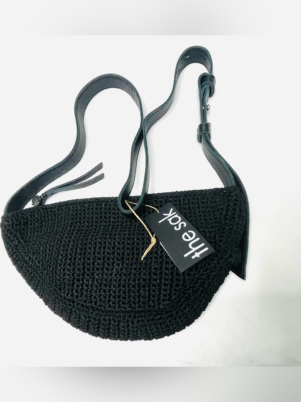 The Sak Black Crochet Half-Moon Crossbody Bag